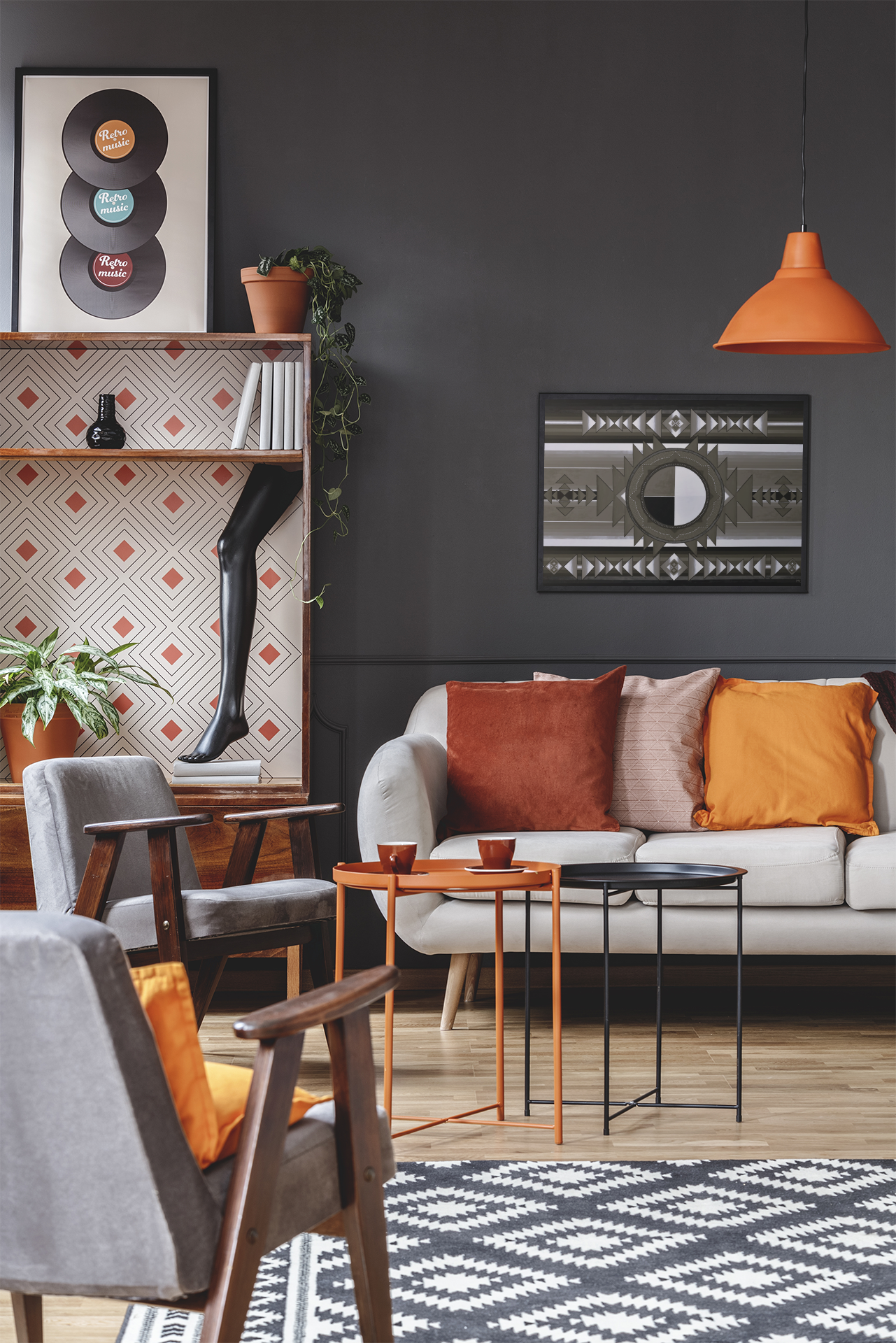 A black and white Indigenous Medicine Wheel giclee art print, hanging on the wall over a couch in a living room