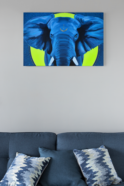 Acrylic painting of an African elephant hanging on the wall over a blue couch