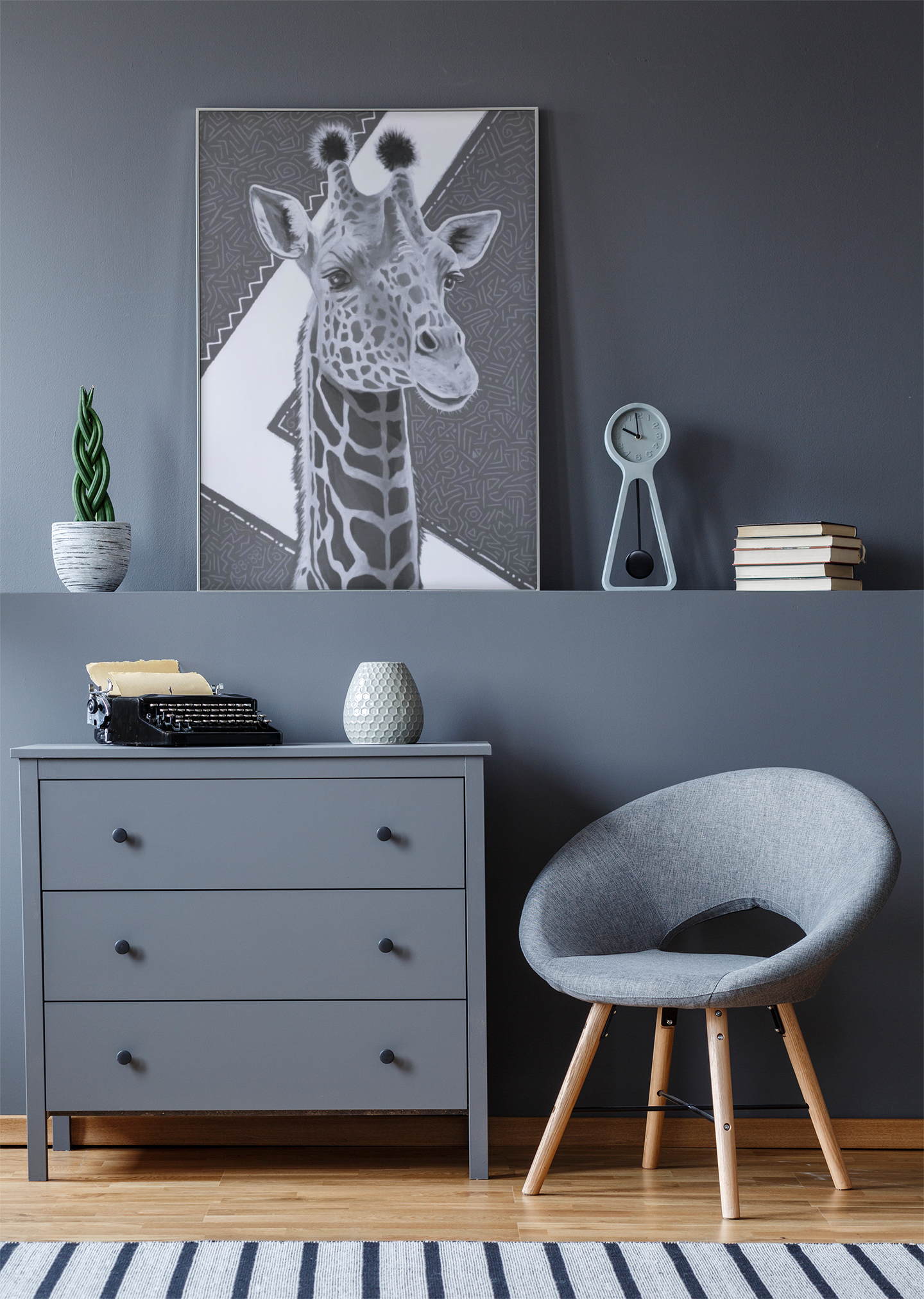 Black and White Canvas print of an original acrylic painting with gold leaf, of a majestic giraffe, with geometric background, leaning up against the wall on a shelf in a bedroom/living room