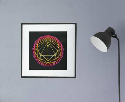 Giclee art print of an original acrylic painting of sacred geometry art in pink/orange/yellow tones, framed, hanging on the wall next to a lamp