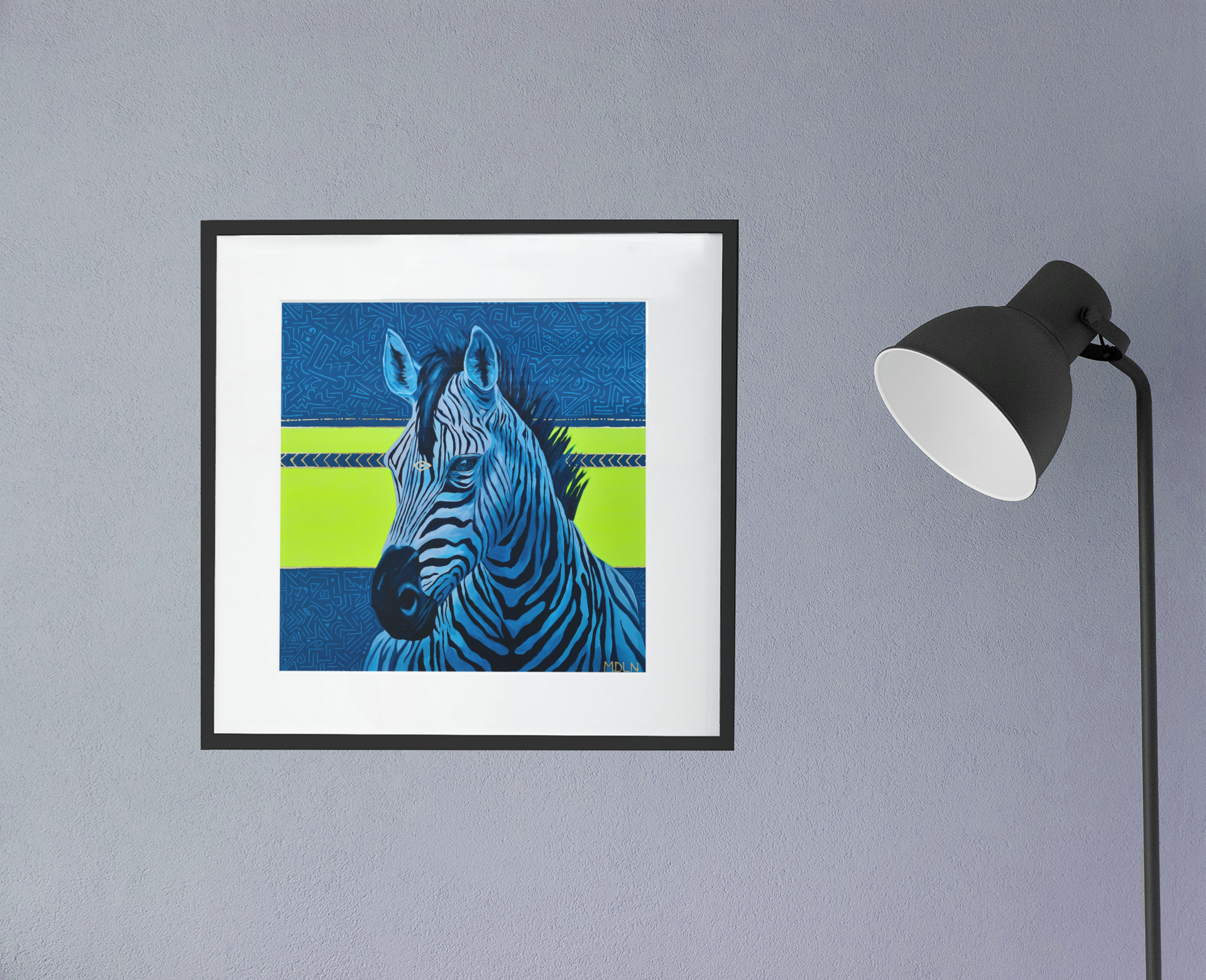 A bright and bold giclee art print of a majestic zebra painting with blue and neon yellow abstract background, zebra art framed in black with white matting, hanging on a wall next to a lamp